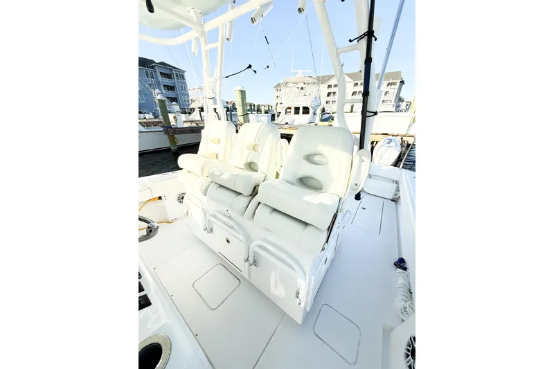 Slide: The Image of 2022 Onslow Bay 41 Tournament boat with luxurious seating at the dock. - 15