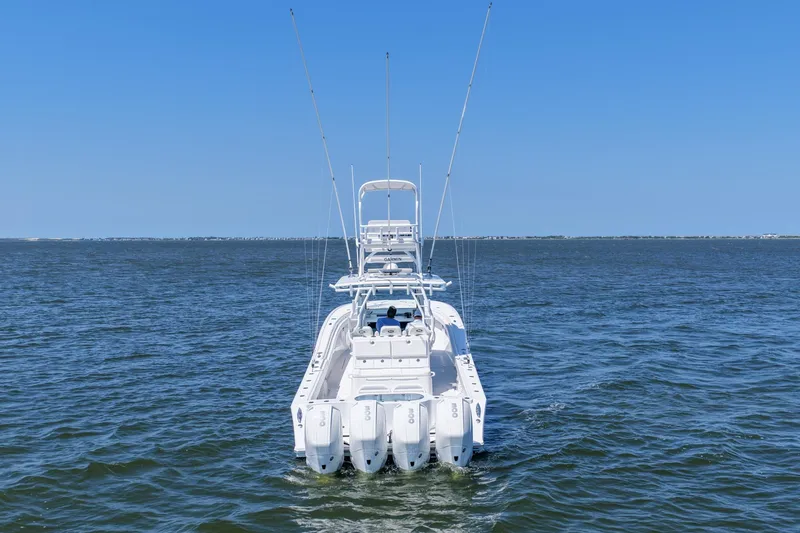 Slide: The Image of 2022 Onslow Bay 41 Tournament boat docked under clear blue sky. - 45