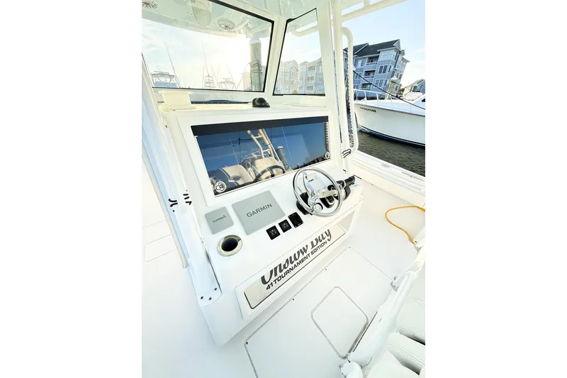 Slide: The Image of 2022 Onslow Bay 41 Tournament boat helm with Garmin navigation system. - 8