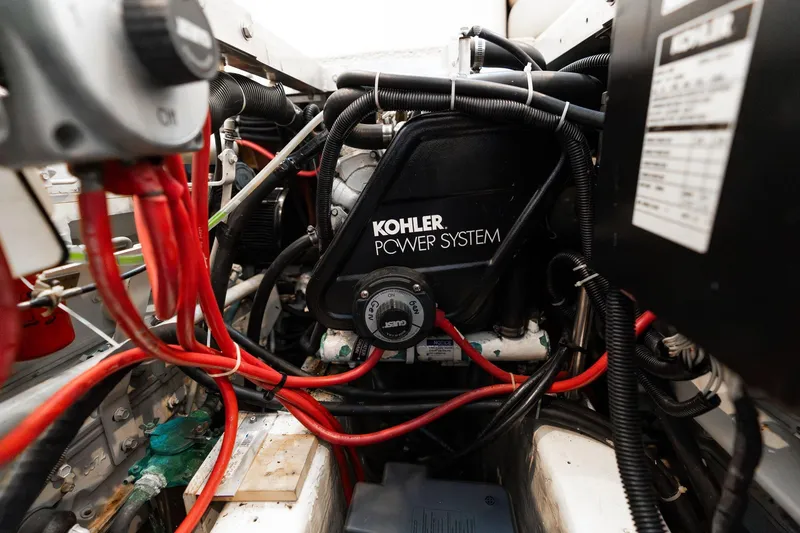 Slide: The Image of Engine compartment of 2000 Carver 404 Cockpit Motor Yacht with Kohler power system. - 53