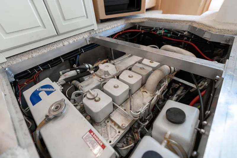 Slide: The Image of Engine compartment of a 2000 Carver 404 Cockpit Motor Yacht with Cummins engine. - 54