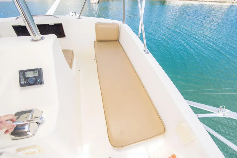 Slide: The Image of Flybridge of 1986 Ocean Yachts 48 Super Sport with beige seating and control panel. - 15