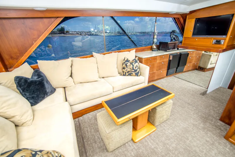 Slide: The Image of Luxurious interior of 1986 Ocean Yachts 48 Super Sport with plush seating and scenic window views. - 19