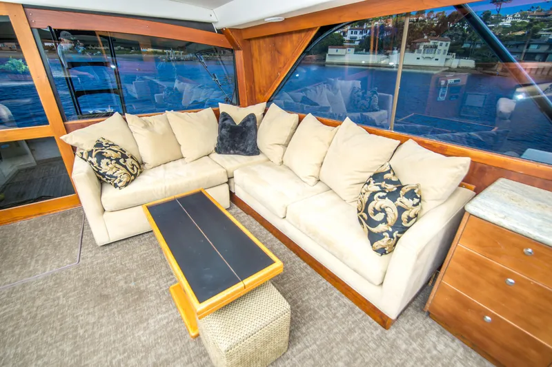 Slide: The Image of Luxurious interior of 1986 Ocean Yachts 48 Super Sport with plush seating and elegant decor. - 21