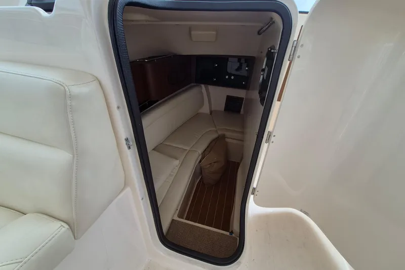 Slide: The Image of Interior cabin of 2022 Grady-White Freedom 335 boat, featuring comfortable seating. - 6