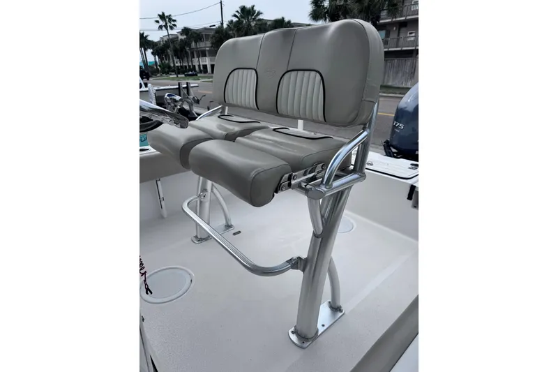 Slide: The Image of 2018 Sea Fox 206 Commander boat seat with stainless steel frame and cushioned backrest. - 11