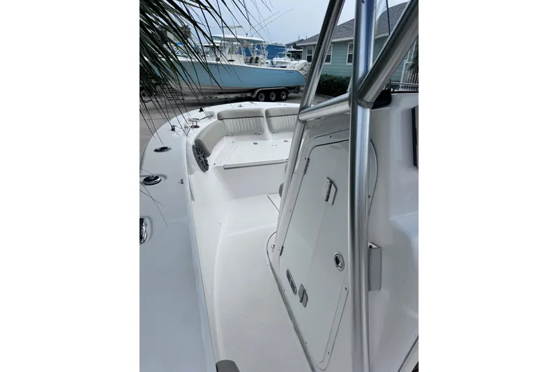 Slide: The Image of 2018 Sea Fox 206 Commander boat interior with seating and storage compartments. - 12