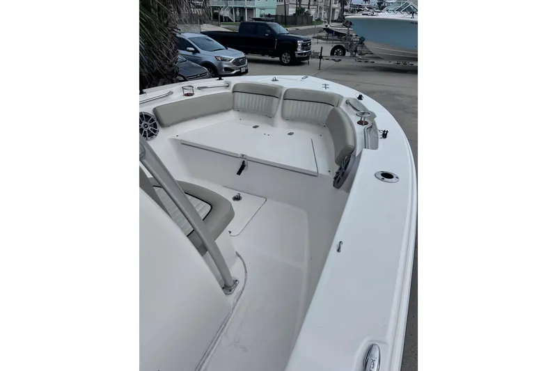 Slide: The Image of 2018 Sea Fox 206 Commander boat interior with seating and storage compartments. - 13