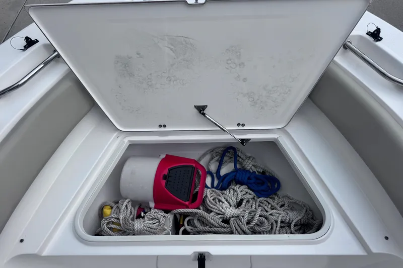 Slide: The Image of Open storage compartment on 2018 Sea Fox 206 Commander boat with ropes and equipment. - 15