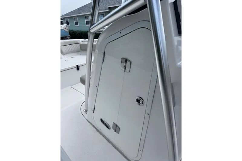 Slide: The Image of 2018 Sea Fox 206 Commander boat interior with storage compartment and seating. - 24