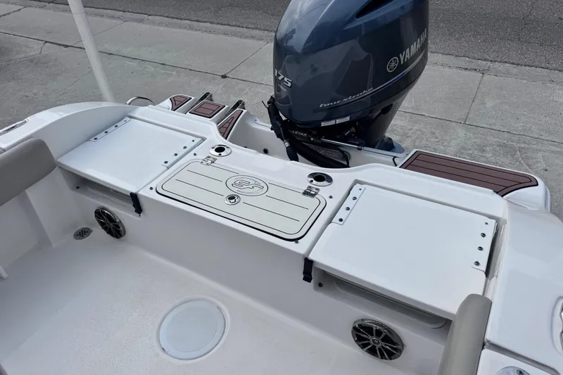 Slide: The Image of 2018 Sea Fox 206 Commander boat with Yamaha outboard motor, featuring spacious deck layout. - 26