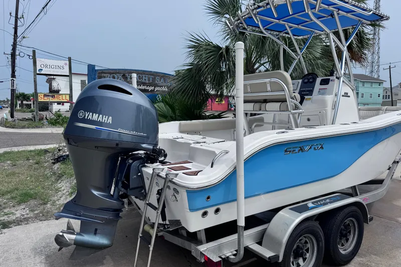 Slide: The Image of 2018 Sea Fox 206 Commander boat with Yamaha engine on trailer, parked near yacht sales. - 4