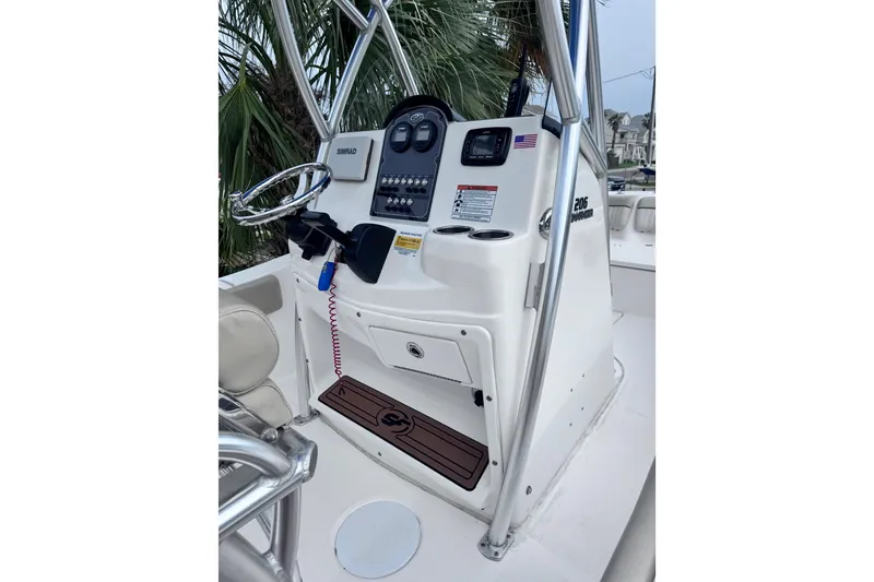 Slide: The Image of 2018 Sea Fox 206 Commander boat console with steering wheel and controls. - 6