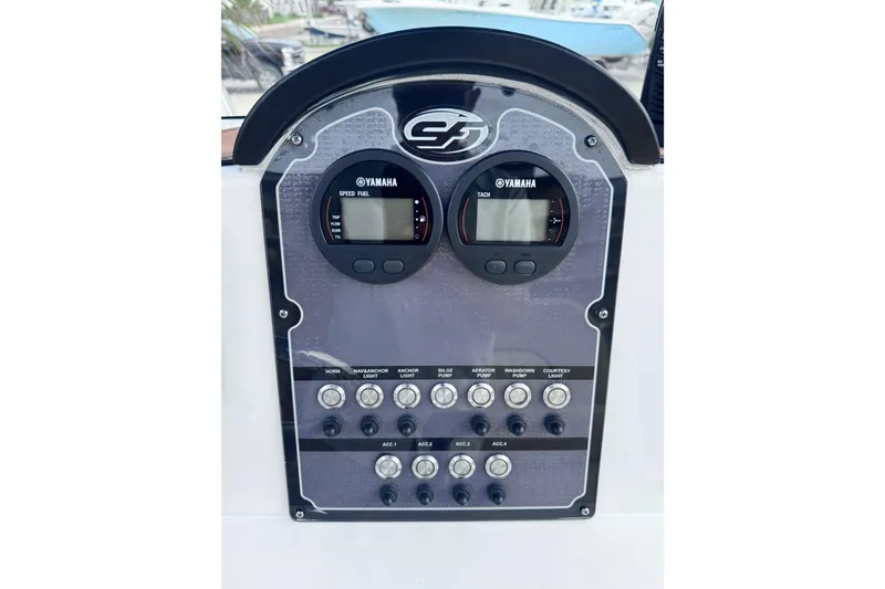 Slide: The Image of 2018 Sea Fox 206 Commander dashboard with Yamaha gauges and control switches. - 8