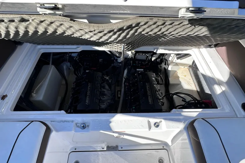 Slide: The Image of 2021 Yamaha Boats 252SD engine compartment with dual high-output engines. - 15