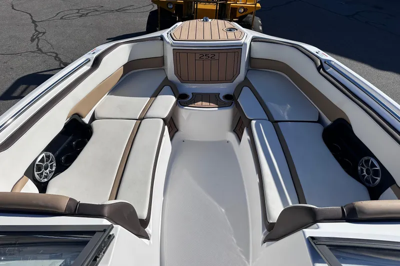 Slide: The Image of 2021 Yamaha Boats 252SD interior with spacious seating and modern design. - 32