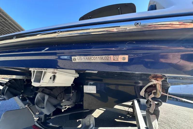 Slide: The Image of 2021 Yamaha Boats 252SD hull identification number on a blue boat exterior. - 41