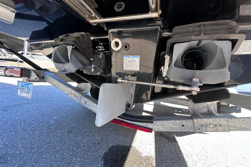 Slide: The Image of Rear view of 2021 Yamaha Boats 252SD jet propulsion system on trailer. - 42