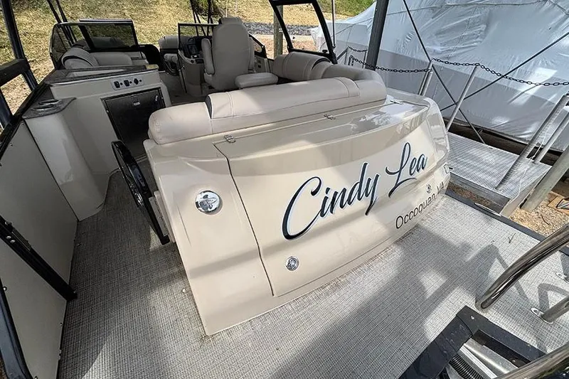 Slide: The Image of 2017 Avalon Ambassador Elite Windshield boat interior with seating and controls. - 6