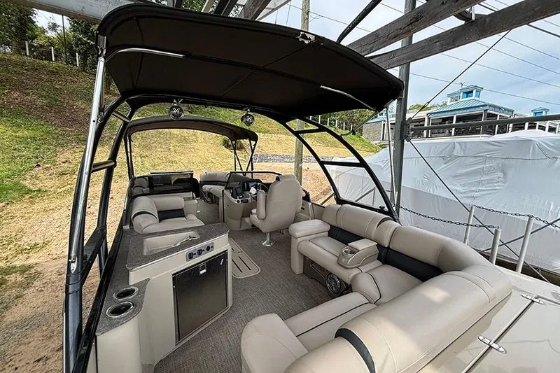 Slide: The Image of Luxurious interior of 2017 Avalon Ambassador Elite Windshield boat, featuring spacious seating and modern amenities. - 8