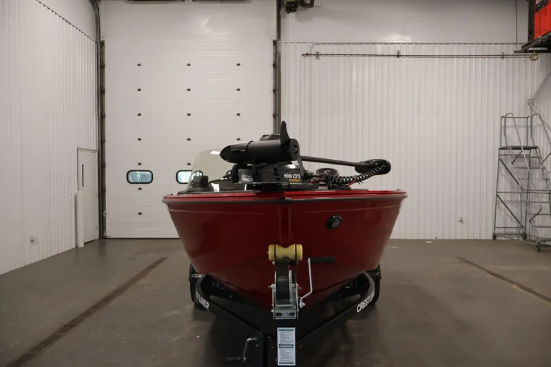 Slide: The Image of 2026 Crestliner 1650 HAWK SC boat in a garage, front view. - 6
