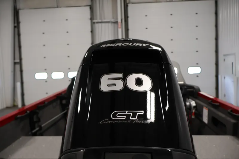 Slide: The Image of 2026 Crestliner 1650 HAWK SC with Mercury 60 CT engine in garage. - 34