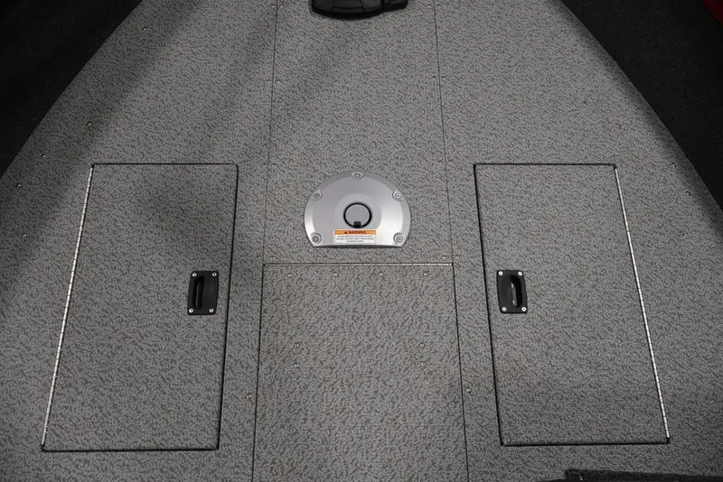 Slide: The Image of 2026 Crestliner 1650 Hawk SC boat deck with storage compartments and circular hatch. - 45