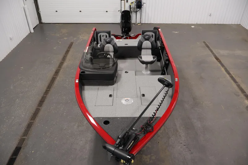 Slide: The Image of 2026 Crestliner 1650 HAWK SC fishing boat, red exterior, spacious interior, dual seating. - 13