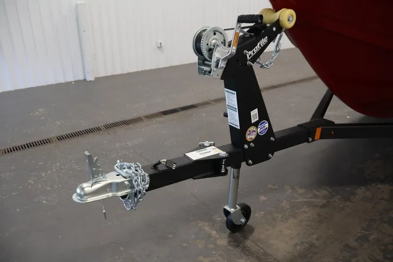 Slide: The Image of Trailer hitch of 2026 Crestliner 1650 Hawk SC boat in a garage setting. - 29