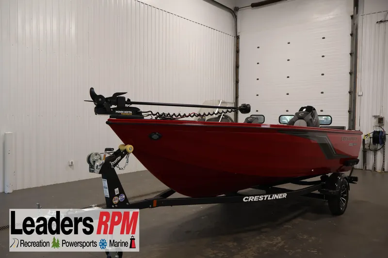 The Image of 2026 Crestliner 1650 HAWK SC boat in showroom, red exterior, on trailer. - 5