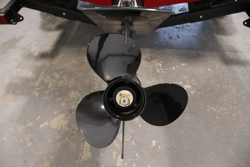Slide: The Image of Propeller of 2026 Crestliner 1650 Hawk SC boat on concrete floor. - 28