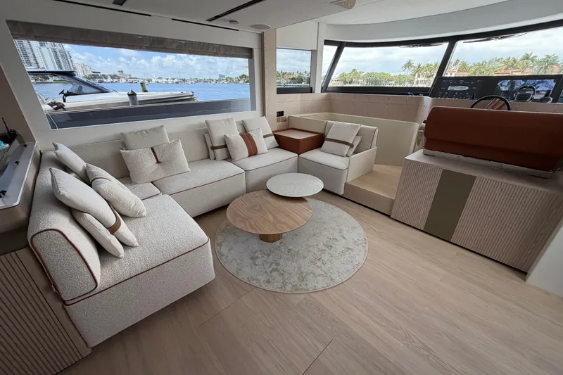 Slide: The Image of Luxurious interior of 2028 Solaris Power 70 Long Range yacht with elegant seating and scenic views. - 14