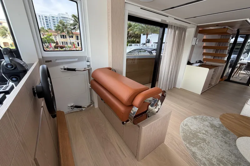Slide: The Image of Interior of 2028 Solaris Power 70 Long Range yacht with modern helm and seating. - 17