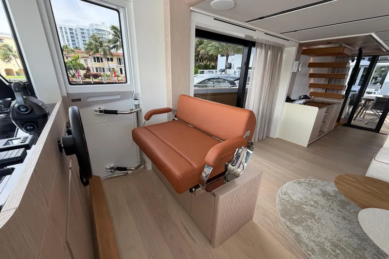 Slide: The Image of Interior of 2028 Solaris Power 70 Long Range yacht with modern helm and seating. - 18