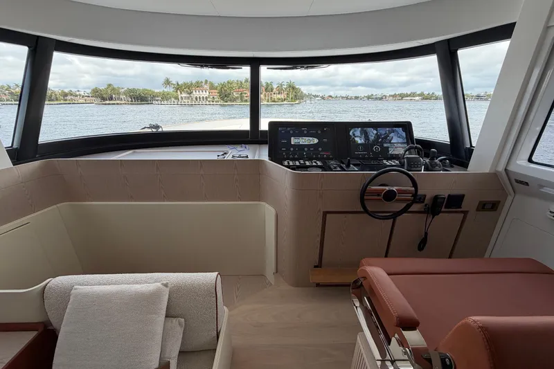 Slide: The Image of Interior view of 2028 Solaris Power 70 Long Range yacht helm with panoramic windows. - 19
