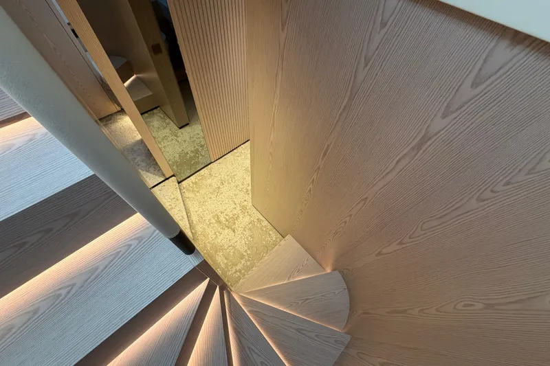 Slide: The Image of Modern interior staircase with wood paneling on Solaris Power 70 Long Range yacht, 2028 model. - 24
