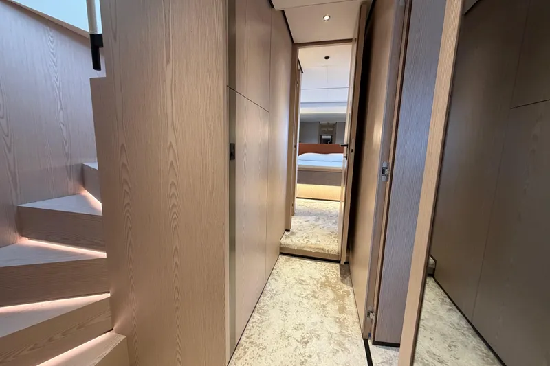 Slide: The Image of Modern interior of 2028 Solaris Power 70 Long Range yacht with wooden finishes and elegant design. - 25