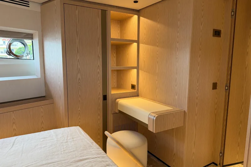 Slide: The Image of Luxurious interior of 2028 Solaris Power 70 Long Range yacht with elegant wood finishes. - 28