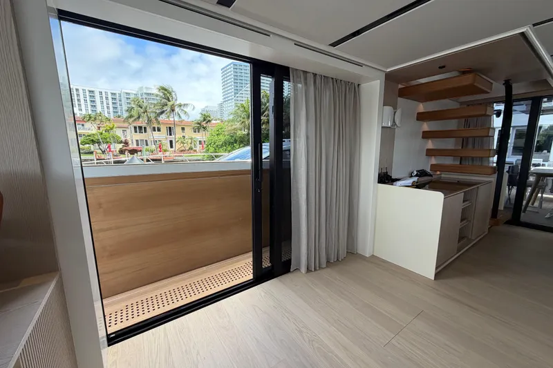 Slide: The Image of Interior view of 2028 Solaris Power 70 Long Range yacht, featuring modern design and outdoor access. - 39