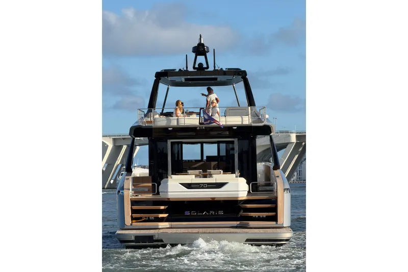 Slide: The Image of 2028 Solaris Power 70 Long Range yacht cruising on open water. - 4