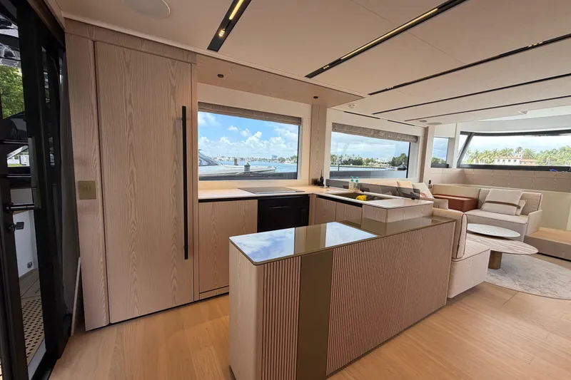 Slide: The Image of Luxurious interior of 2028 Solaris Power 70 Long Range yacht with modern kitchen and seating area. - 46