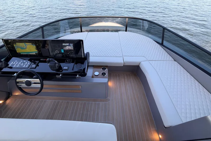 Slide: The Image of Luxurious helm of 2028 Solaris Power 70 Long Range yacht with modern controls and seating. - 48