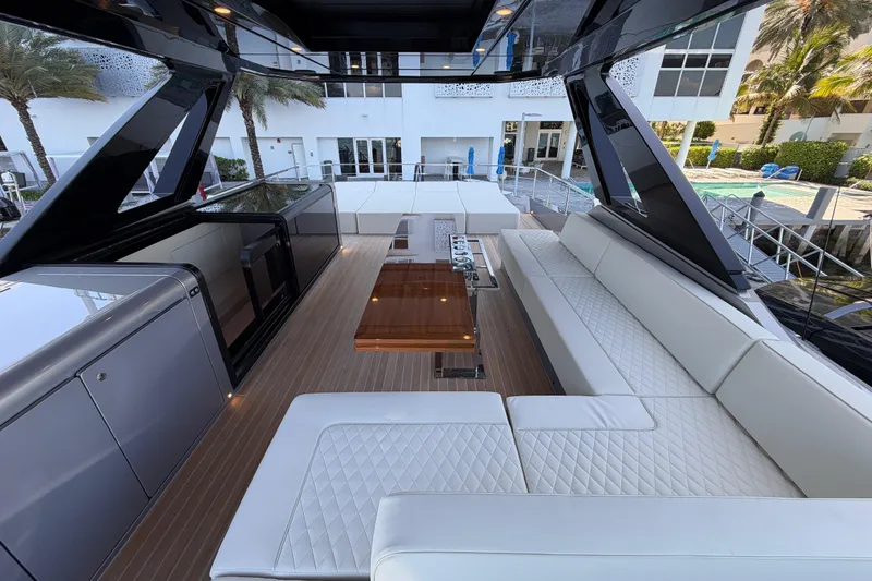 Slide: The Image of Luxurious deck of 2028 Solaris Power 70 Long Range yacht with elegant seating and table. - 50