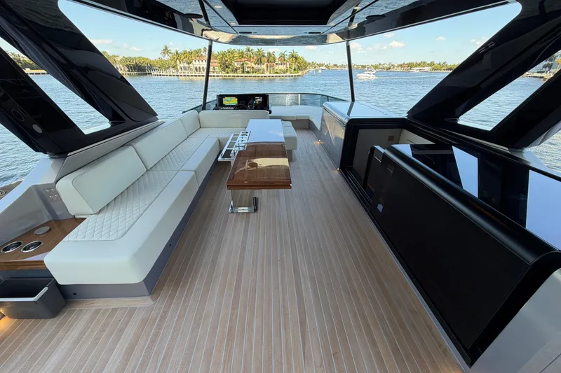 Slide: The Image of Luxurious interior of 2028 Solaris Power 70 Long Range yacht with elegant seating and scenic views. - 52