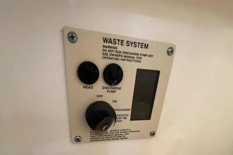 Slide: The Image of Waste system control panel on 2015 Sea Ray Sundancer 280. - 25