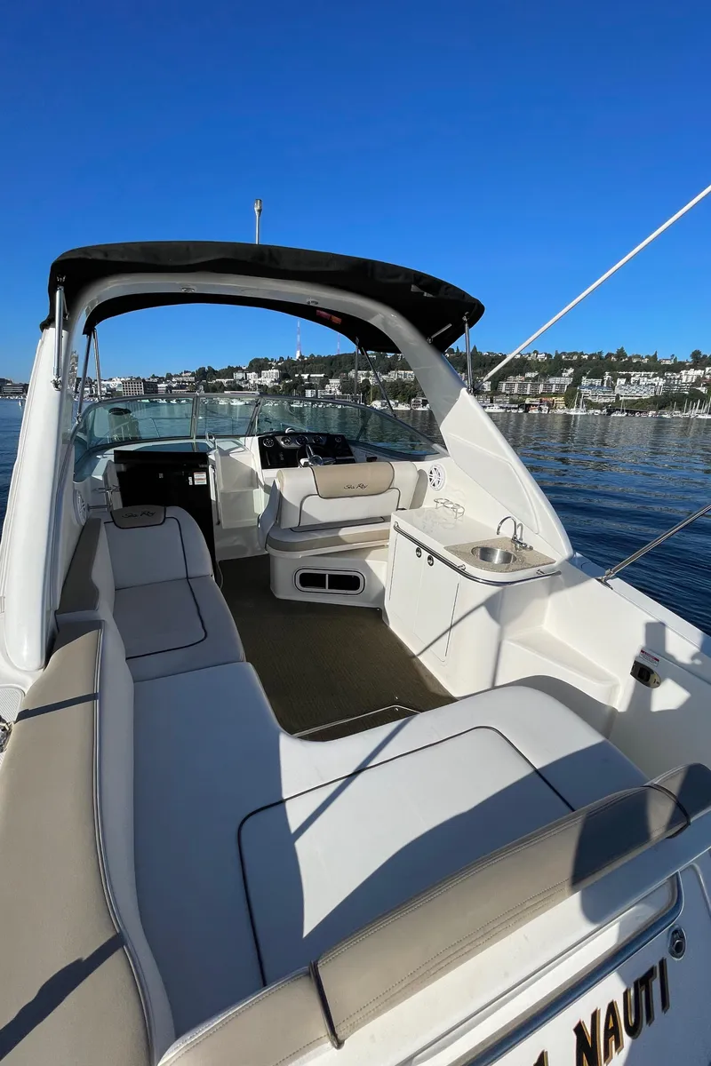 Slide: The Image of 2015 Sea Ray Sundancer 280 on calm waters, interior view. - 5