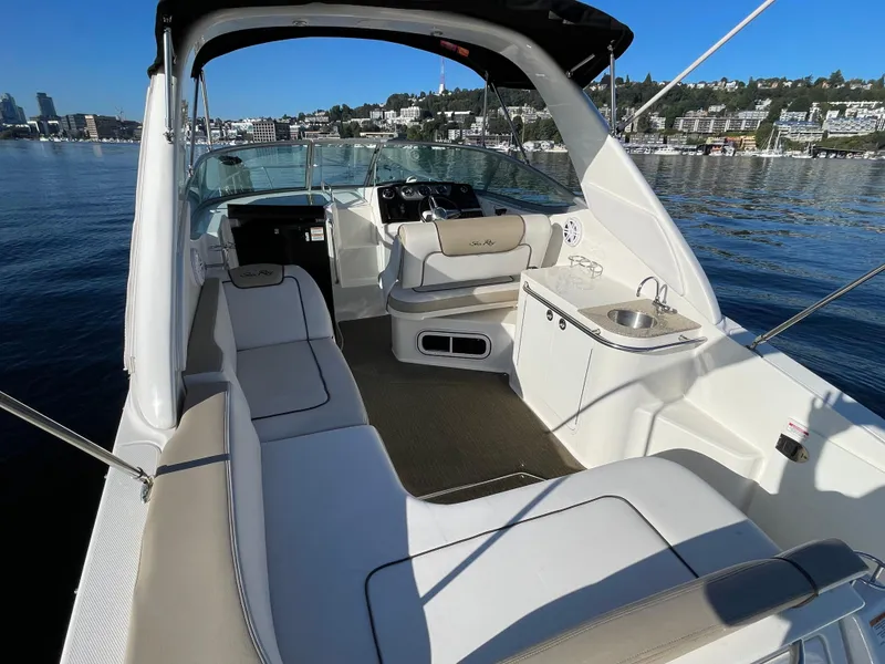 Slide: The Image of Interior view of a 2015 Sea Ray Sundancer 280 yacht on calm waters. - 6
