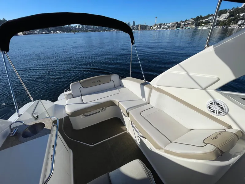 Slide: The Image of Interior of a 2015 Sea Ray Sundancer 280 yacht on calm waters. - 9