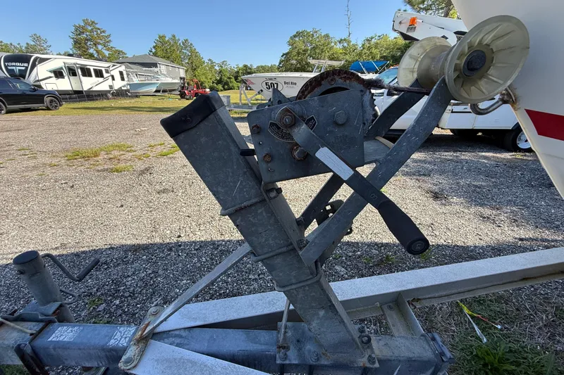Slide: The Image of Trailer winch mechanism for 2000 Sport-Craft 241 Walk Around boat in outdoor setting. - 102