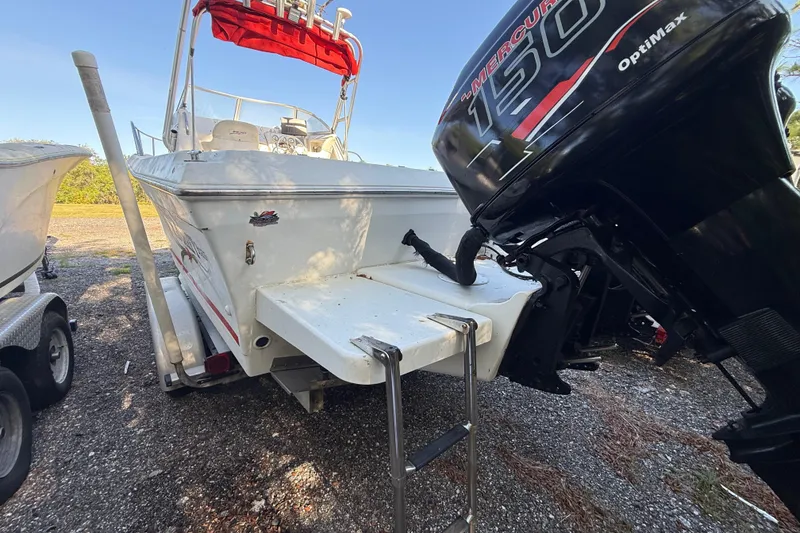 Slide: The Image of 2000 Sport-Craft 241 Walk Around boat with Mercury 150 OptiMax engine. - 18
